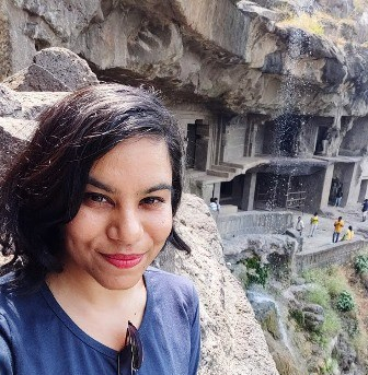 Glee at one of the Buddhist caves in Ellora